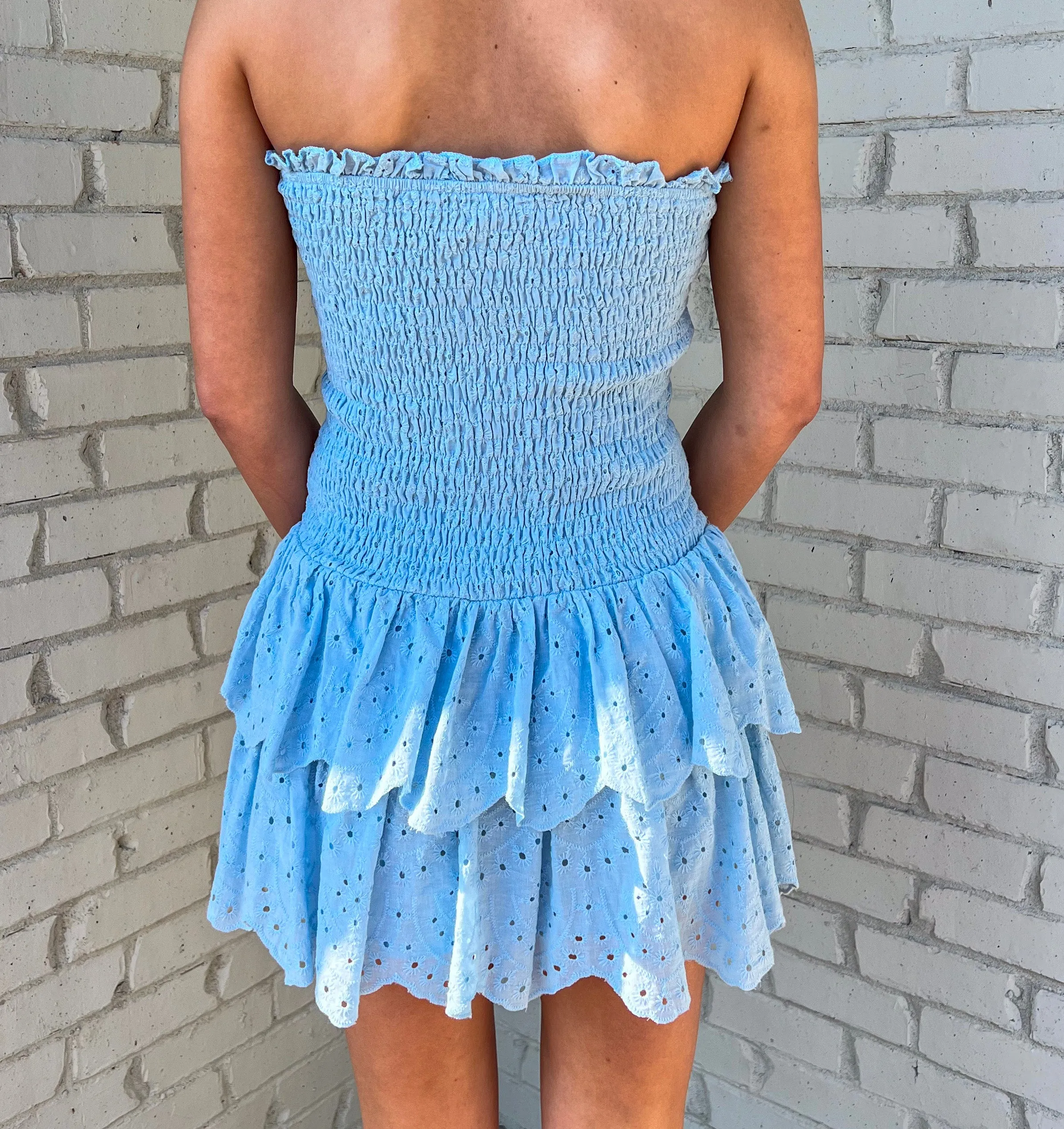 GAME CHANGER STRAPLESS SMOCKED EYELET DRESS